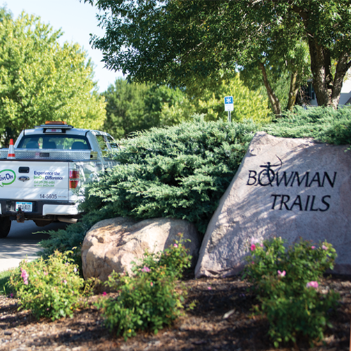 An ImOn truck driving down the street of a Cedar Rapids new residential service area.