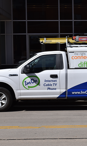 300x500-Thumbnail-Image-ImOn-install-truck-infront-of-building.png